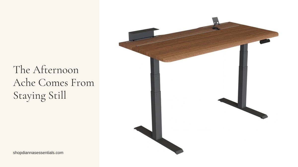 Vari ComfortEdge electric standing desk with a walnut top and black frame