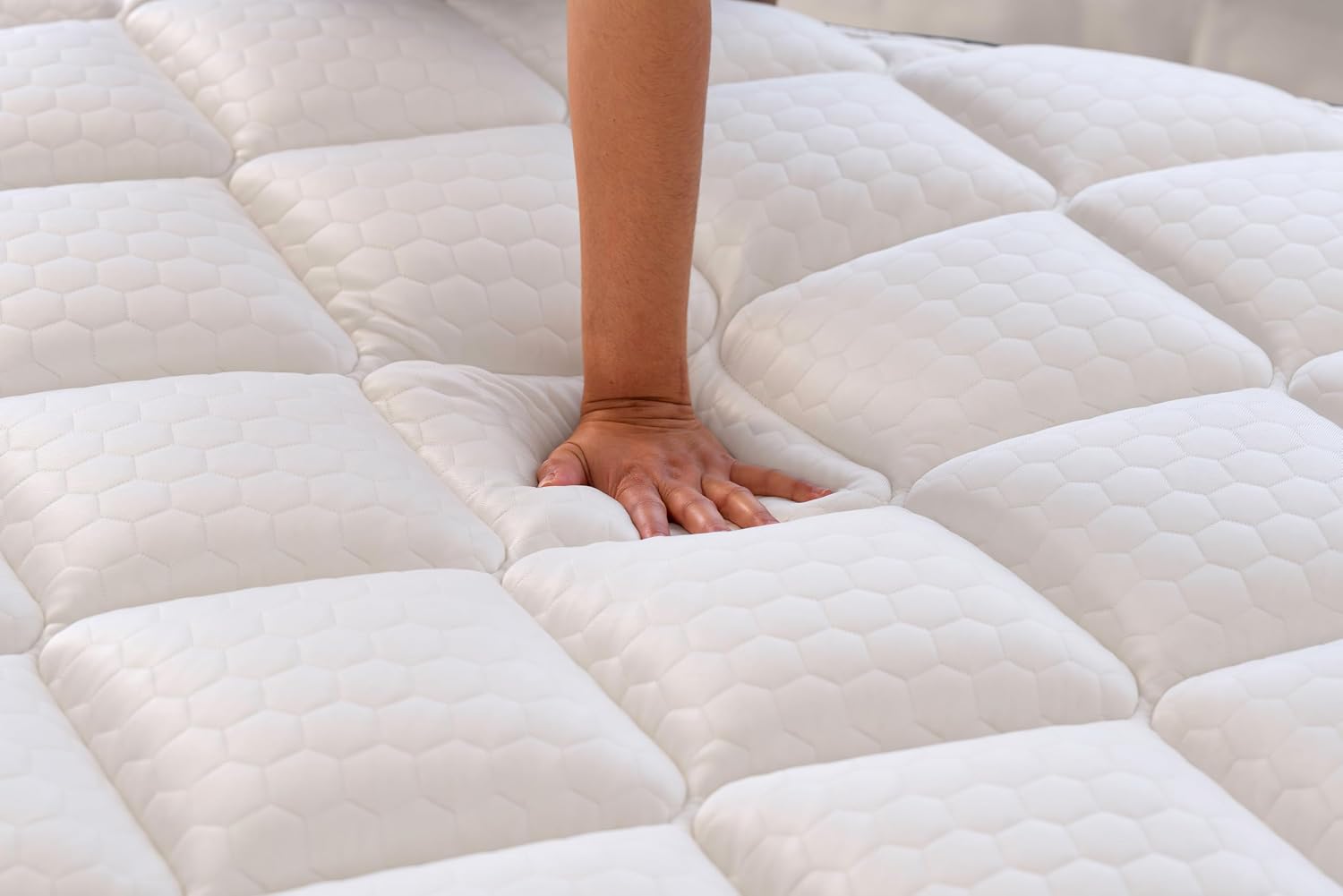 Close-up of the Brooklyn Bedding CopperFlex Pro's cool-to-the-touch quilted cover texture