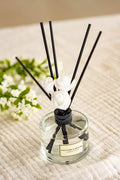 CULTURE & NATURE Clean Cotton reed diffuser set 6.7oz with rattan sticks on shelf