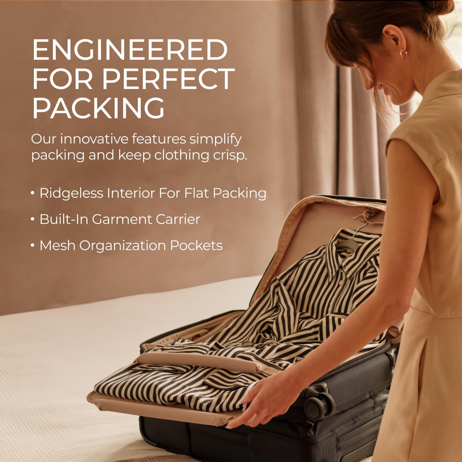 Briggs & Riley Baseline Essential Expandable Spinner Luggage interior packing view with patterned lining