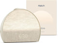 Hatch Restore 3 sunrise alarm clock in putty finish displaying 6:30, shown with its retail box