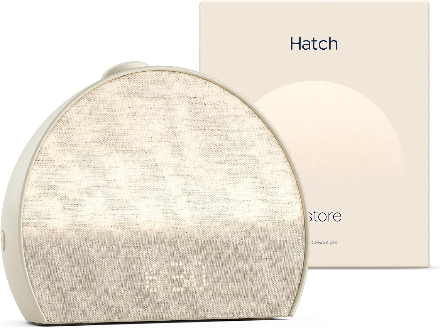Hatch Restore 3 sunrise alarm clock in putty finish displaying 6:30, shown with its retail box