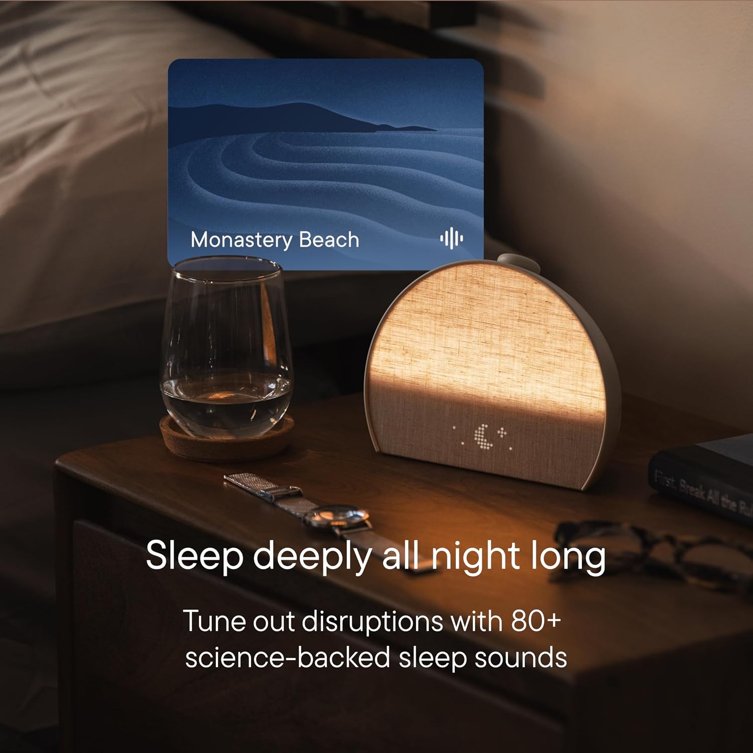 Hatch Restore 3 glowing warmly on a nightstand with sleep sounds, promoting deep all-night sleep