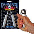Hand squeezing an IronMind Captains of Crush hand gripper, shown with the product packaging