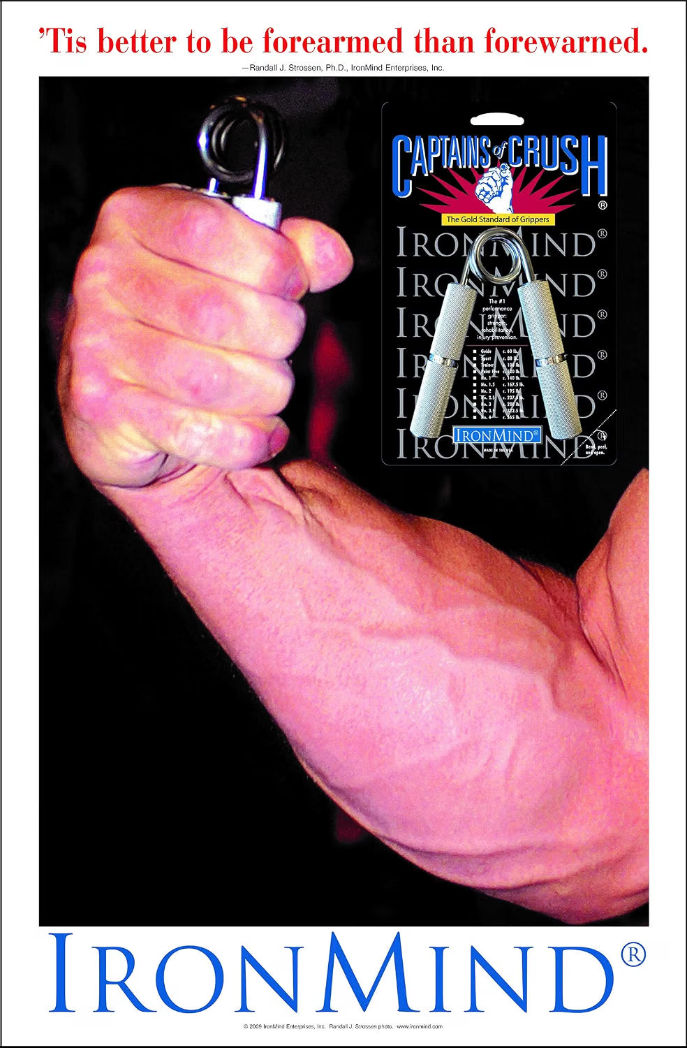 Forearm and hand gripping an IronMind Captains of Crush gripper, showing the strength training in use