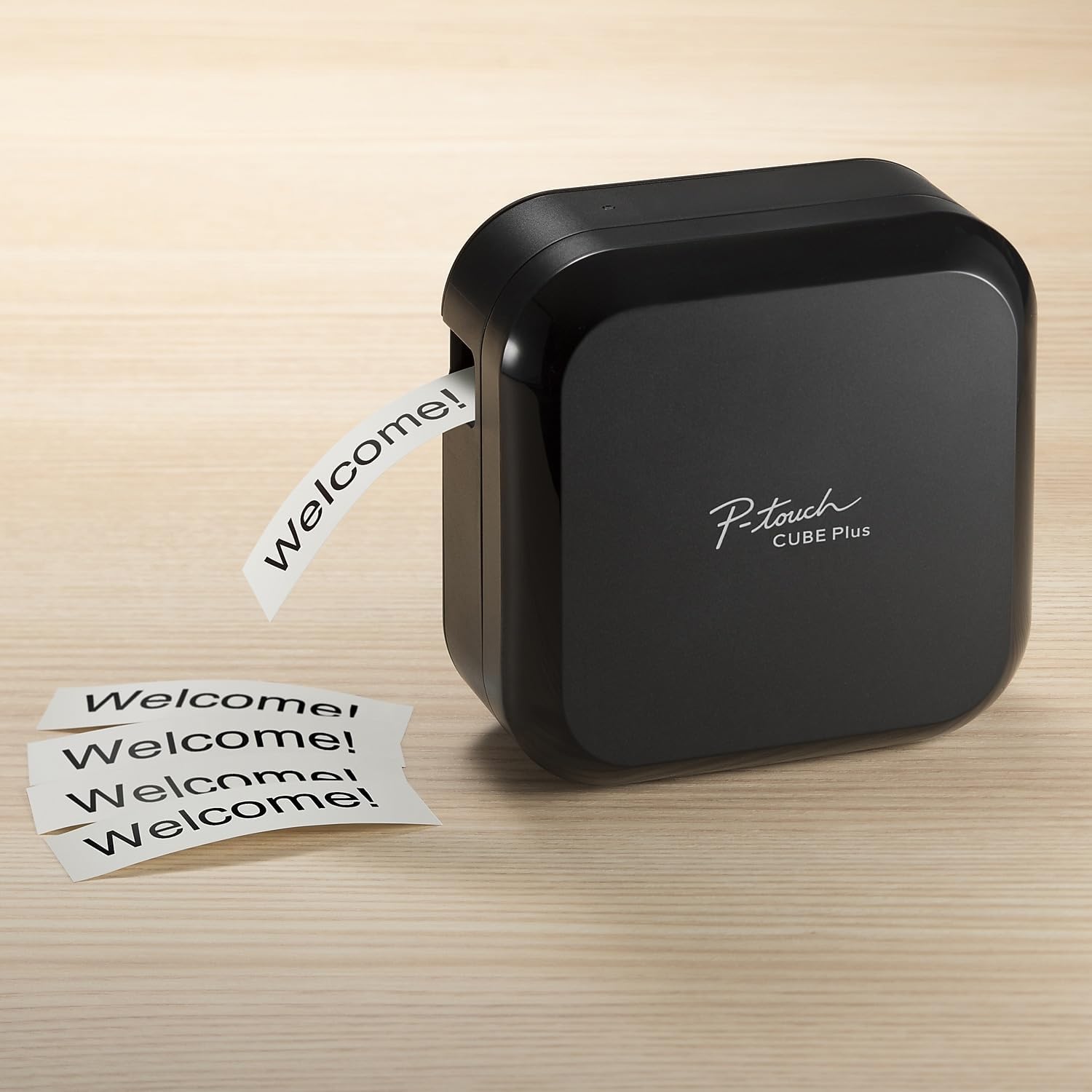 Brother P-touch CUBE Plus Label Maker printing a label