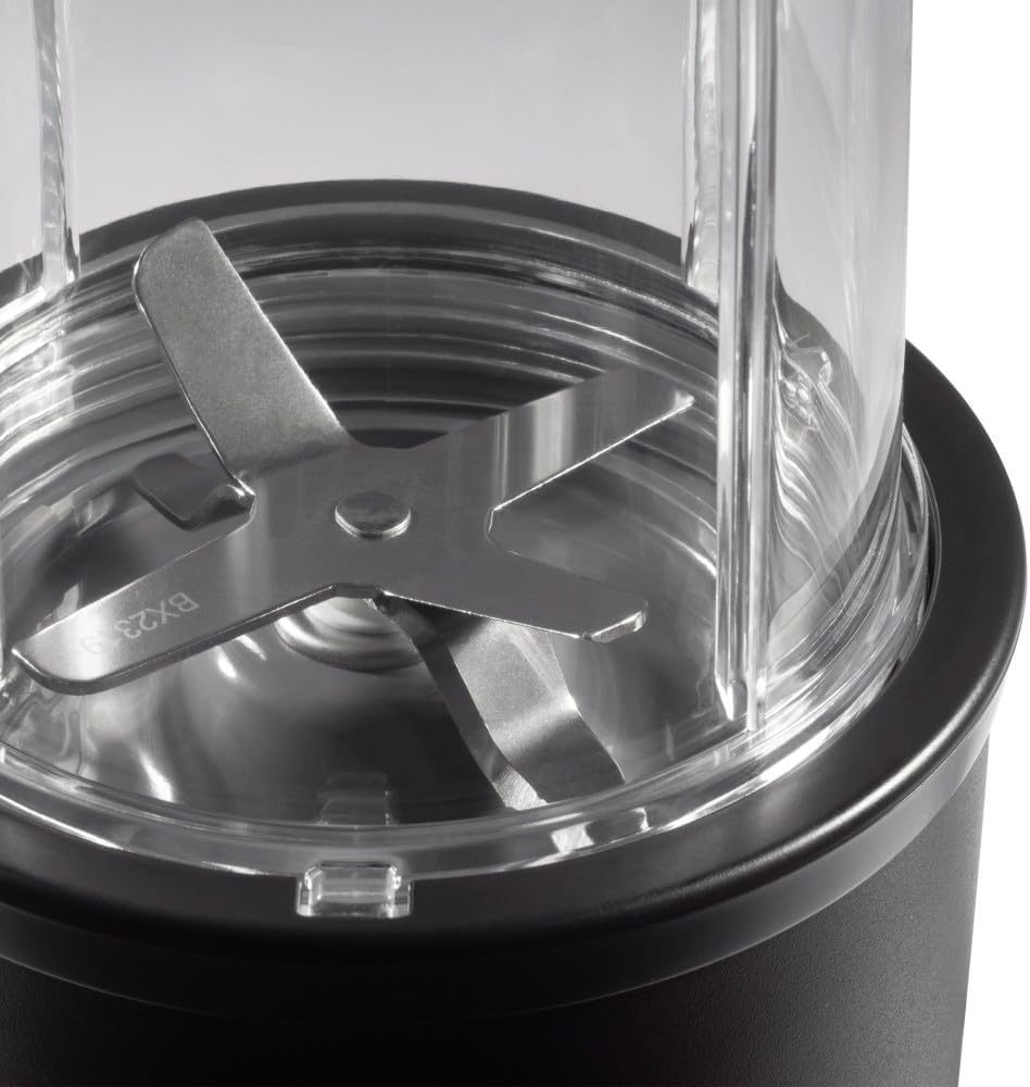 Close-up of the NutriBullet Pro 900 stainless steel extractor blade attached to the cup