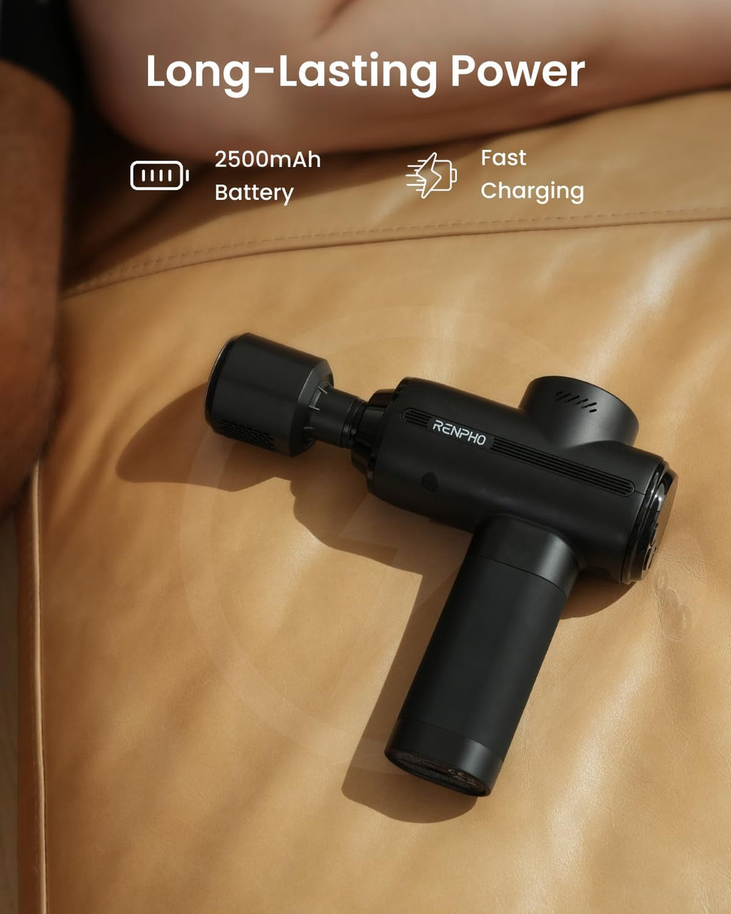 RENPHO Active Thermacool 2 massage gun resting on a leather couch, highlighting its 2500mAh battery and fast charging