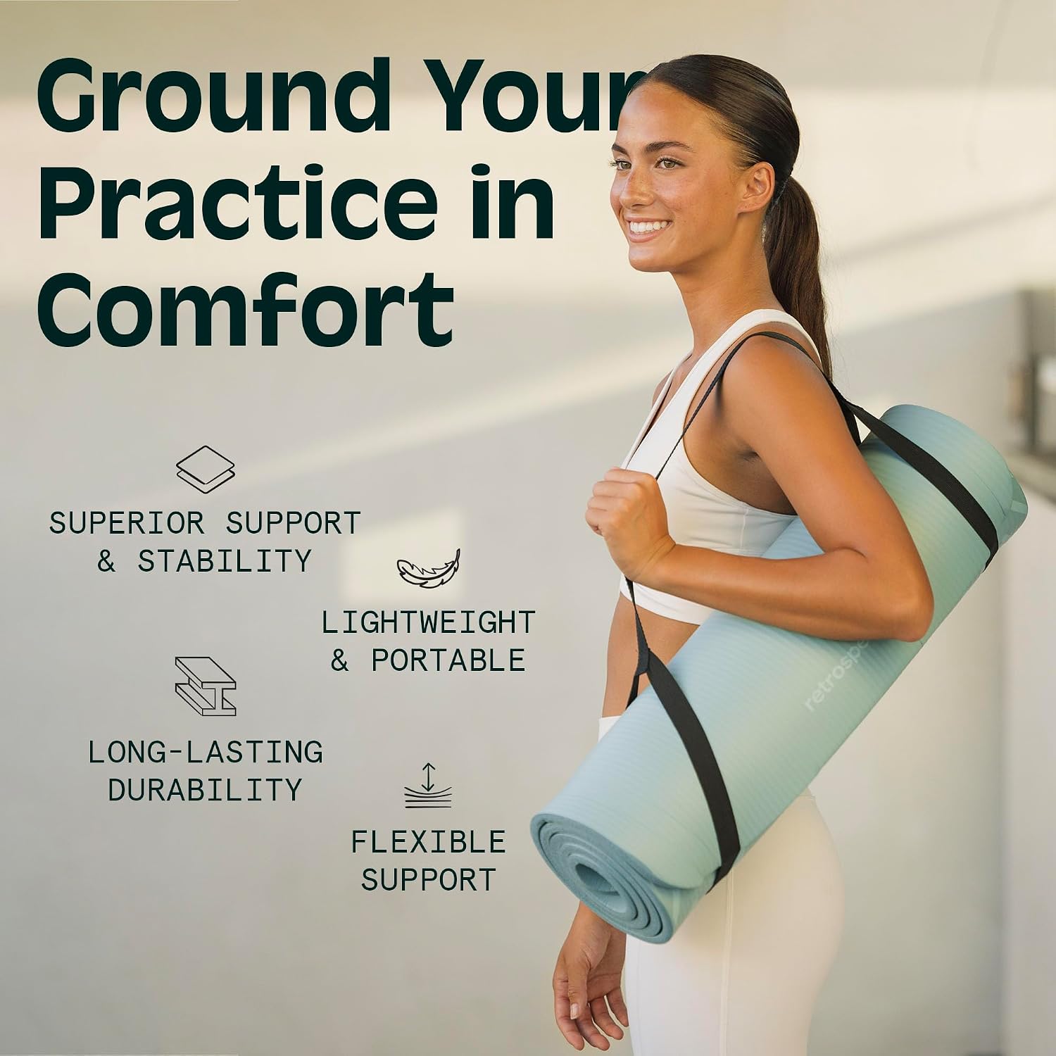 Woman carrying the rolled Retrospec Solana Yoga Mat over her shoulder