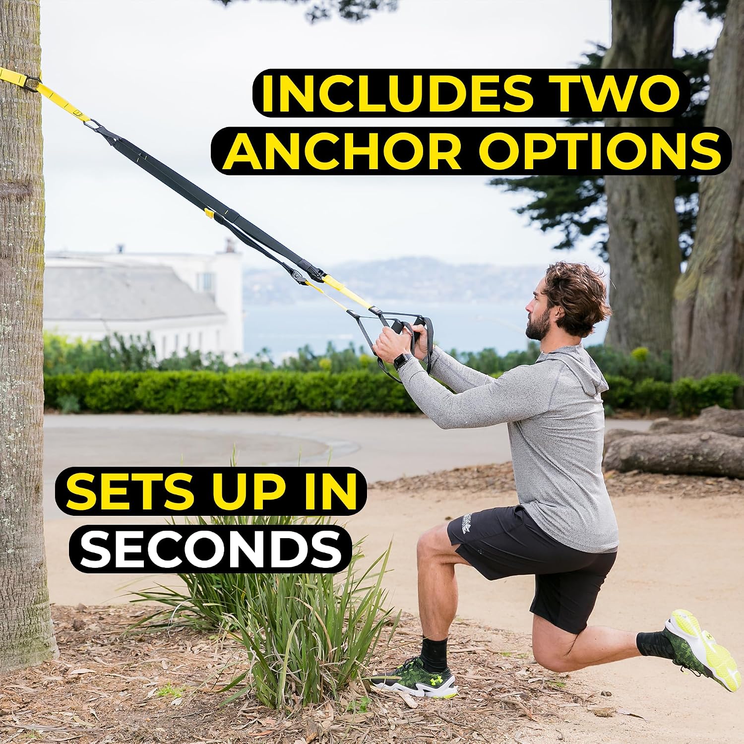 Man doing a TRX lunge anchored to a tree outdoors, text reads Includes two anchor options, sets up in seconds