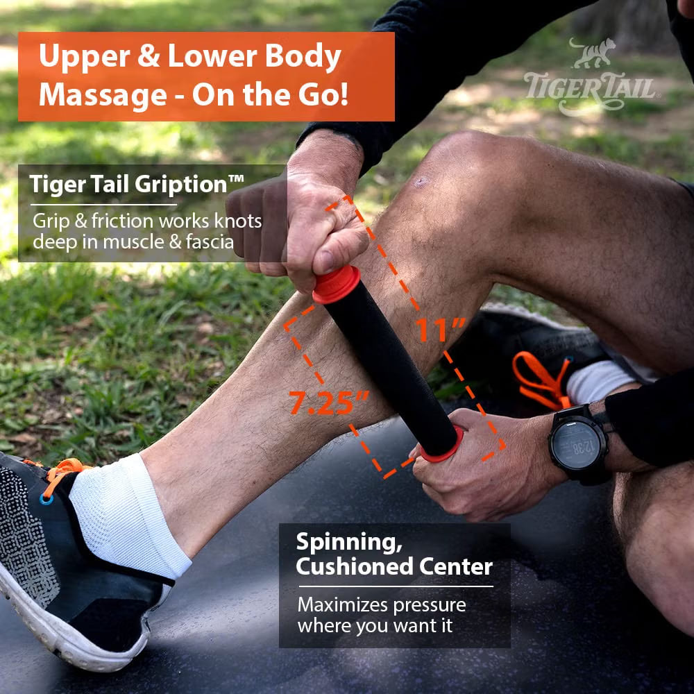 Person rolling a Tiger Tail massage stick along the lower leg for muscle recovery