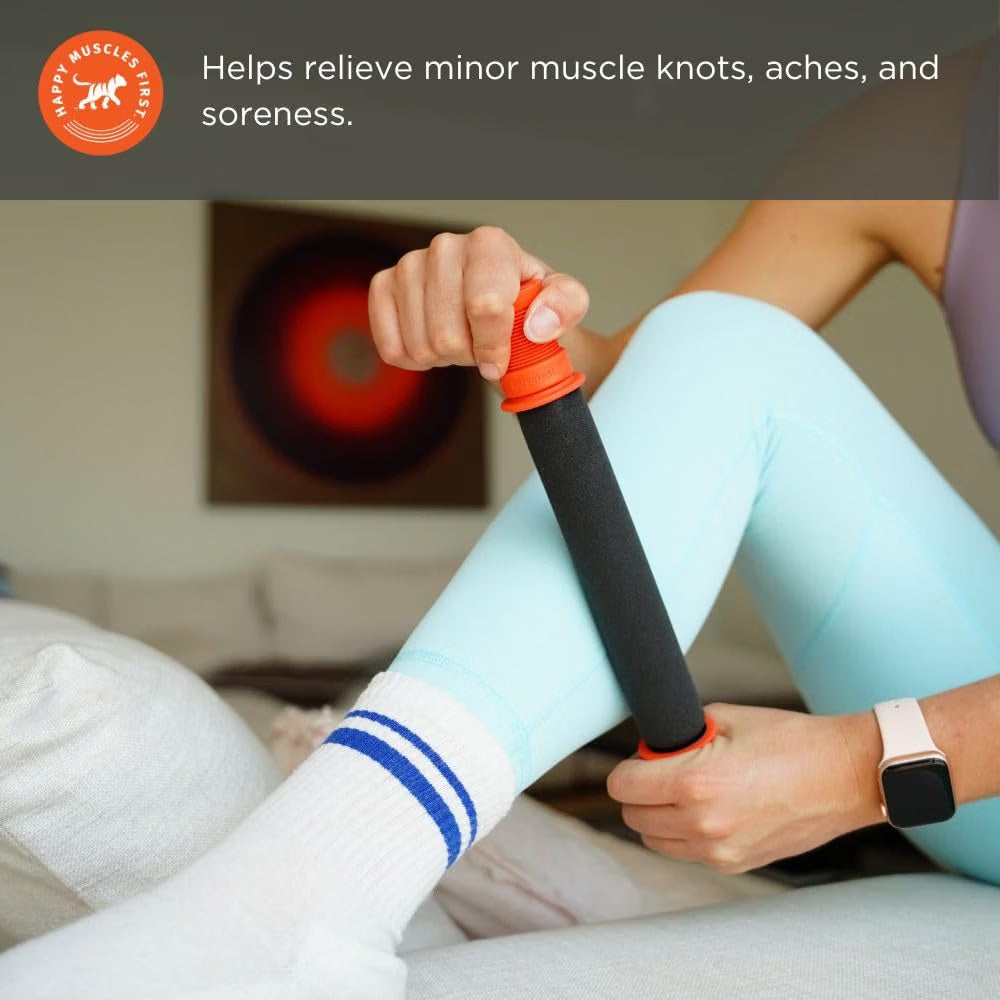 Tiger Tail massage stick roller used on the thigh to release tight muscles
