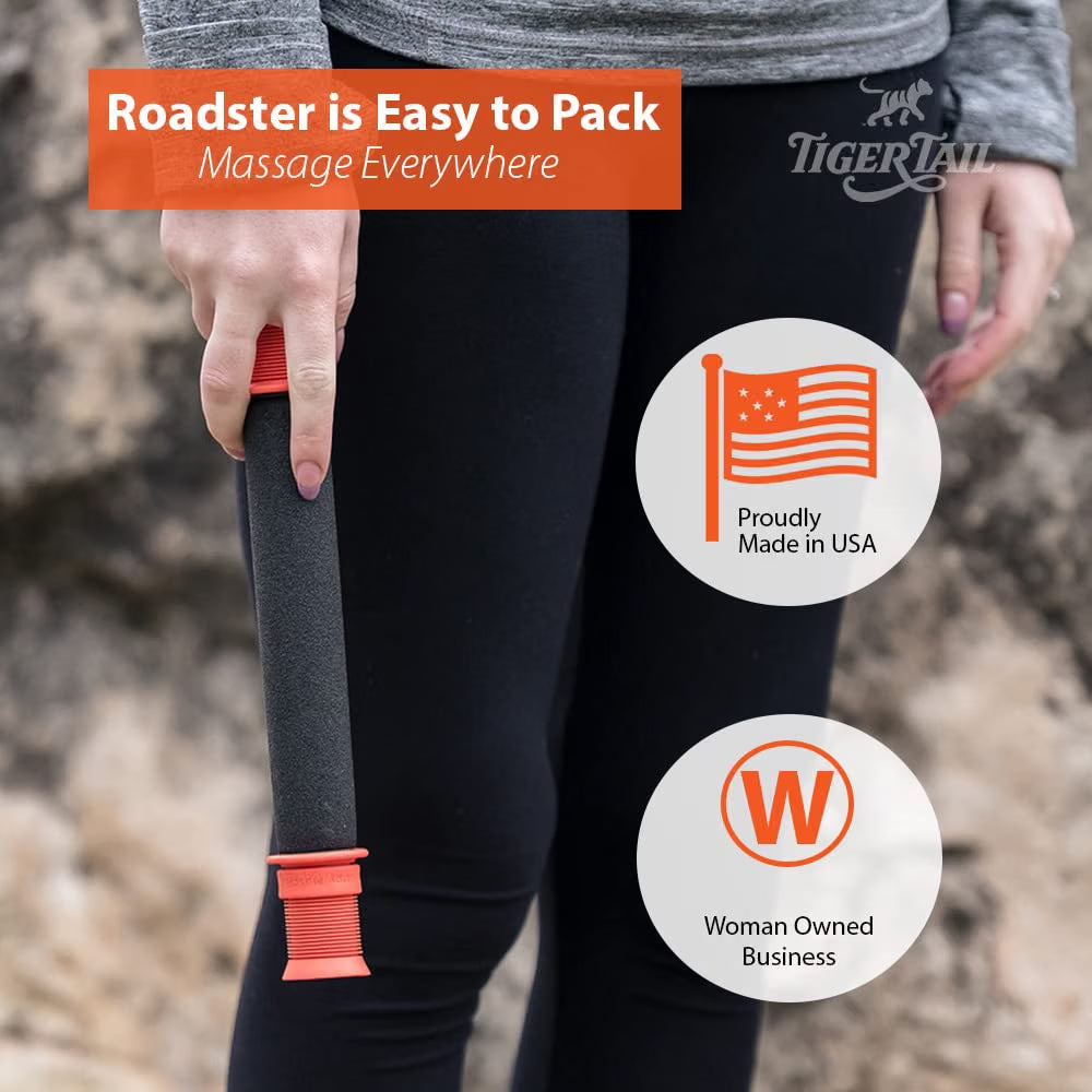 Compact Tiger Tail massage stick roller tucked into a jacket pocket, showing how easy it is to pack