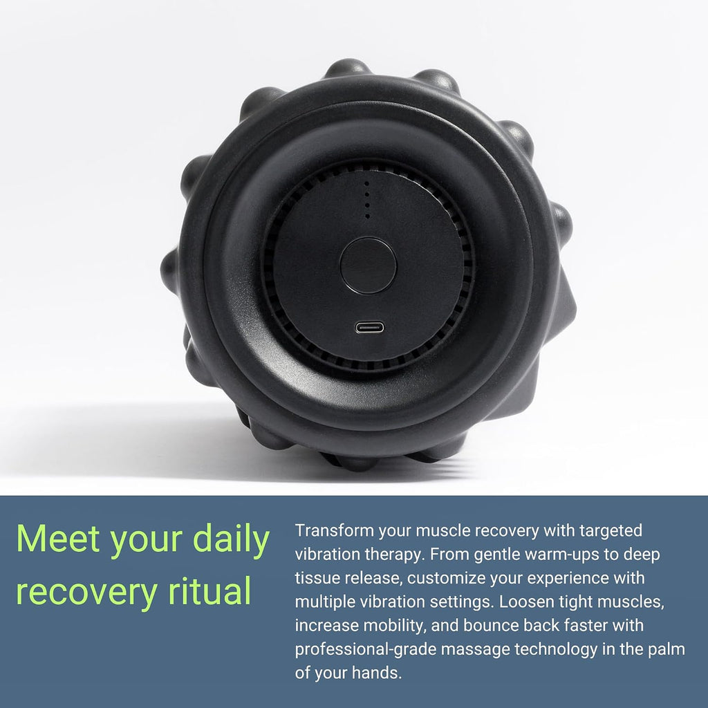 Close-up of the VibePro Flow vibrating foam roller's control button and charging port