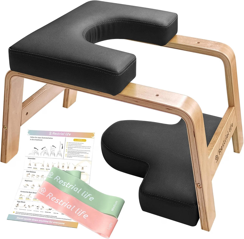 Restrial Life wooden yoga headstand bench in black PU padding with a printed exercise guide
