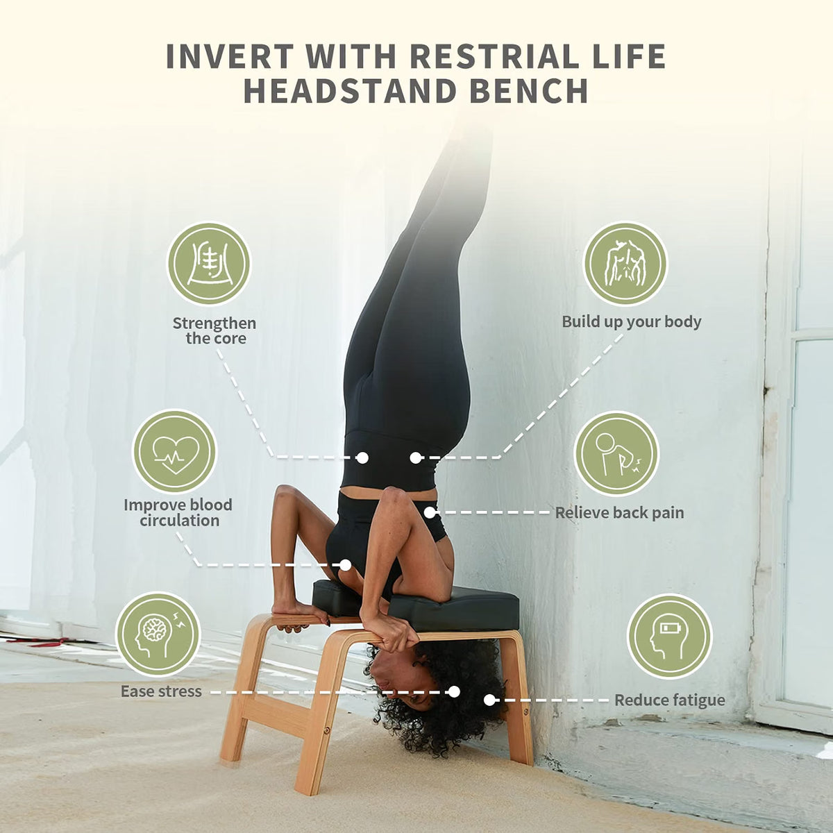 Person doing a full inversion on the Restrial Life wooden yoga headstand bench