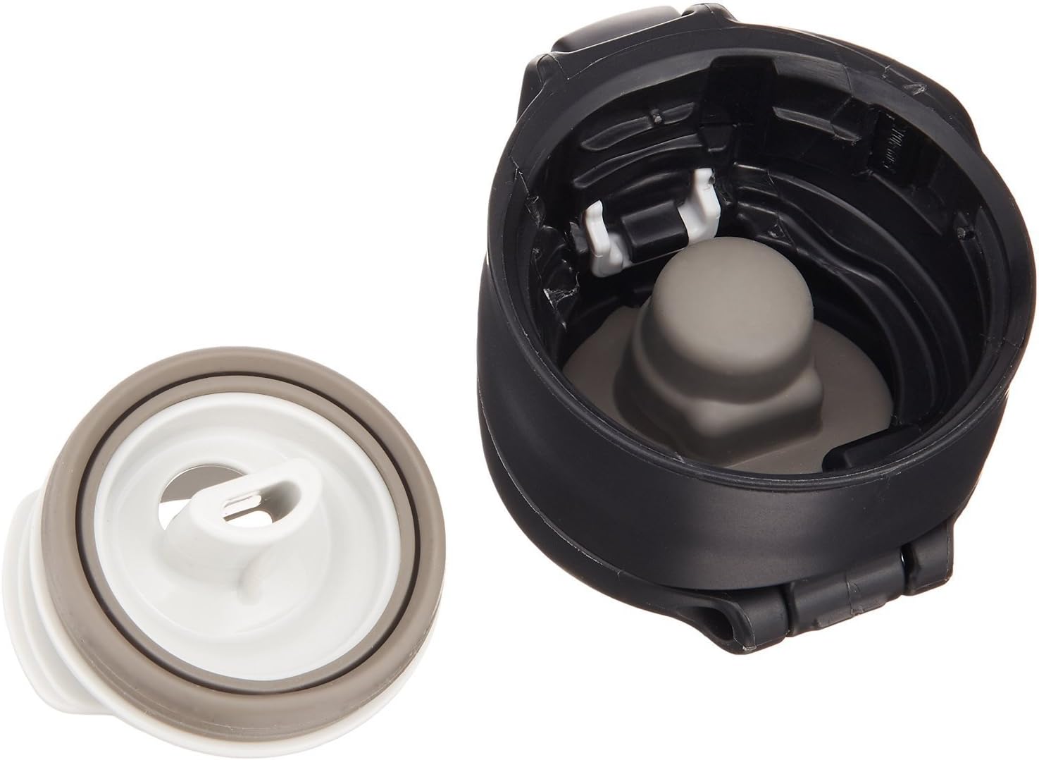 Close-up of the Zojirushi Stainless Steel Travel Mug's cap disassembled, showing the sealed vacuum-insulated design